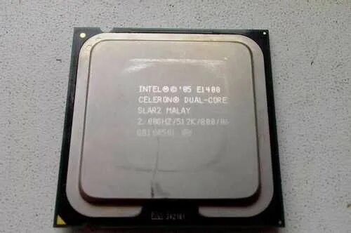 Intel celeron dual. Процессор intel e1400 celeron dual-core slar2 malay. intel celeron dual core e1400. celeron dual-core e1588. intel celeron e1400 2.00ghz.