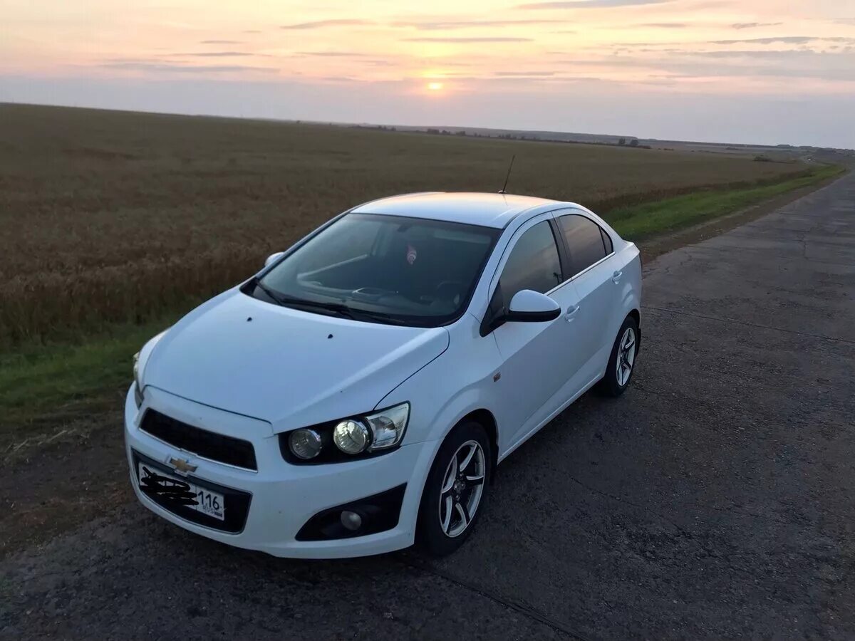 Купил авео 2012. Шевроле Авео седан 2012 белая. Chevrolet Aveo 2012 белый. Шевроле Авео белый седан. Шевроле Авео т300 2012.