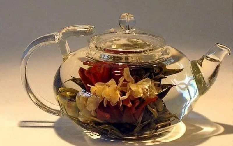 Заварка для цветов. Китайский чай Лотос. Чай китайский цветок раскрывается. Цветочный чай.