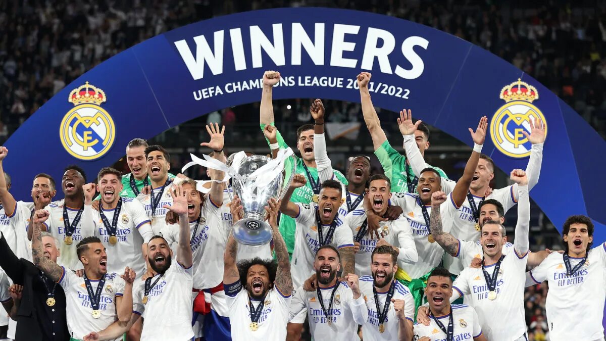 Футбол кубок европы результаты. Реал Мадрид победитель Лиги чемпионов 2022. Реал Мадрид с Кубком ЛЧ 2022. Реал выиграл Лигу чемпионов 2022. Реал Мадрид 2022 Champions League.