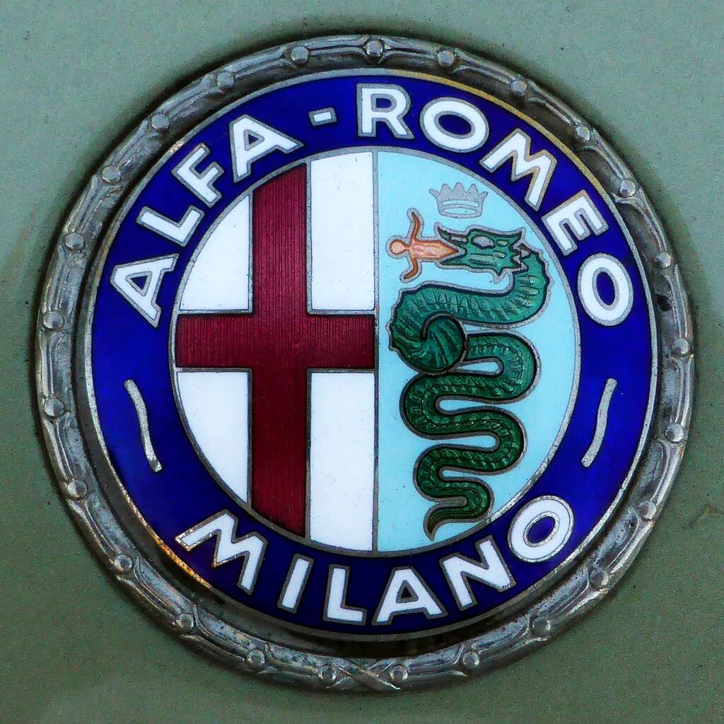 Знак альфа ромео. Alfa Romeo Milano logo. Альфа Ромео знак. Альфа Ромео значок старый. Эмблемы старых Альфа Ромео.