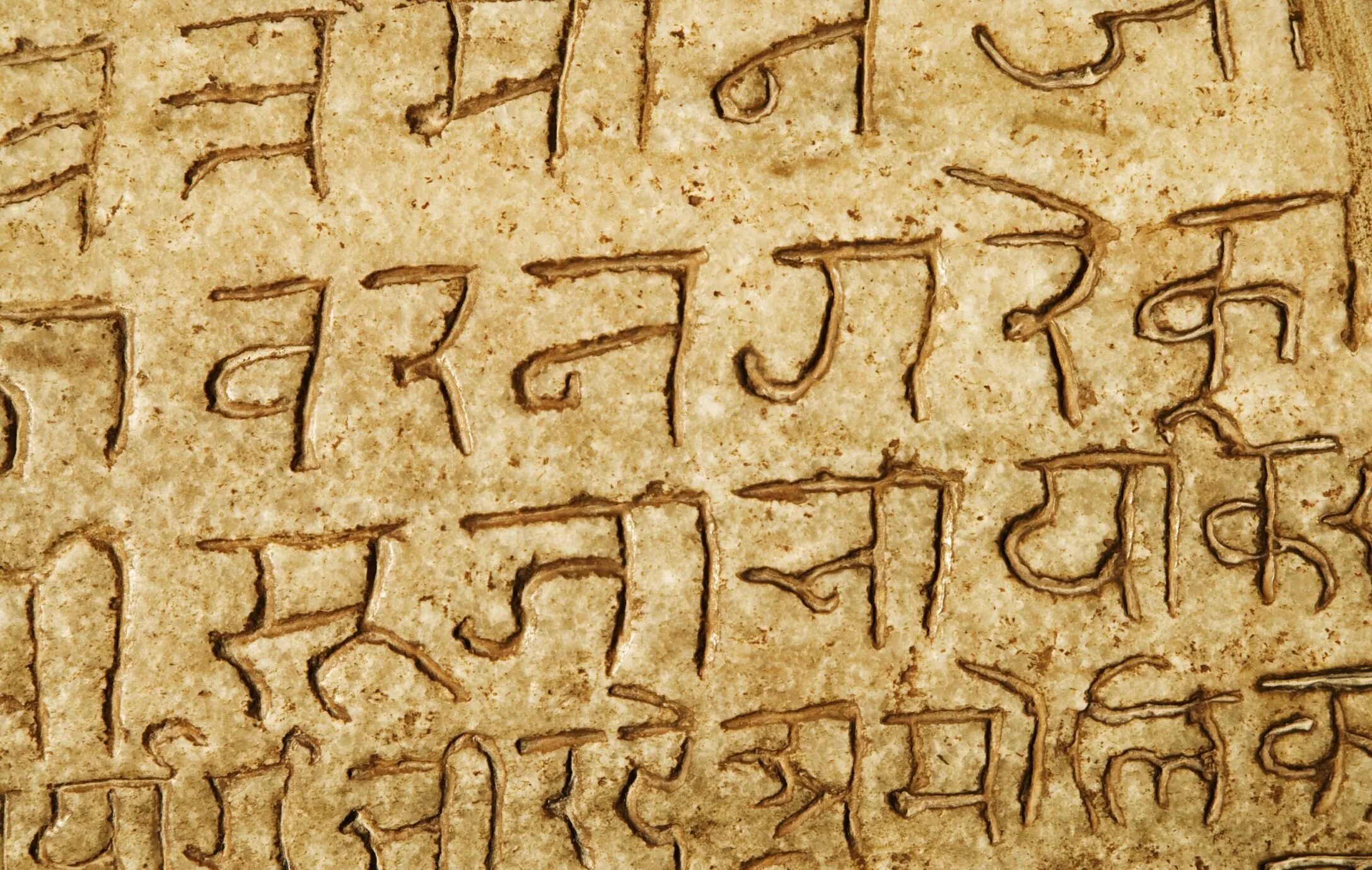 Древнейшие письмена 4 буквы. Санскрит древний язык Индии. Древние письмена санскрит. Письменность древней Индии санскрит. Письмена древней Индии санскрит.