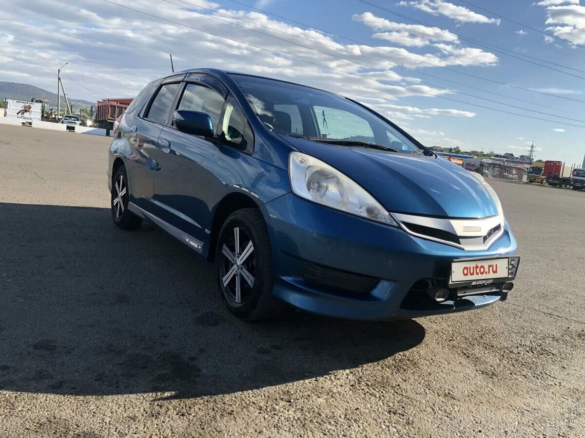 Фит шаттл 2011 год. Honda Fit Shuttle 2011. Honda Fit Shuttle Hybrid 2011. Хонда фит 2013 года. Хонда фит 2012г.