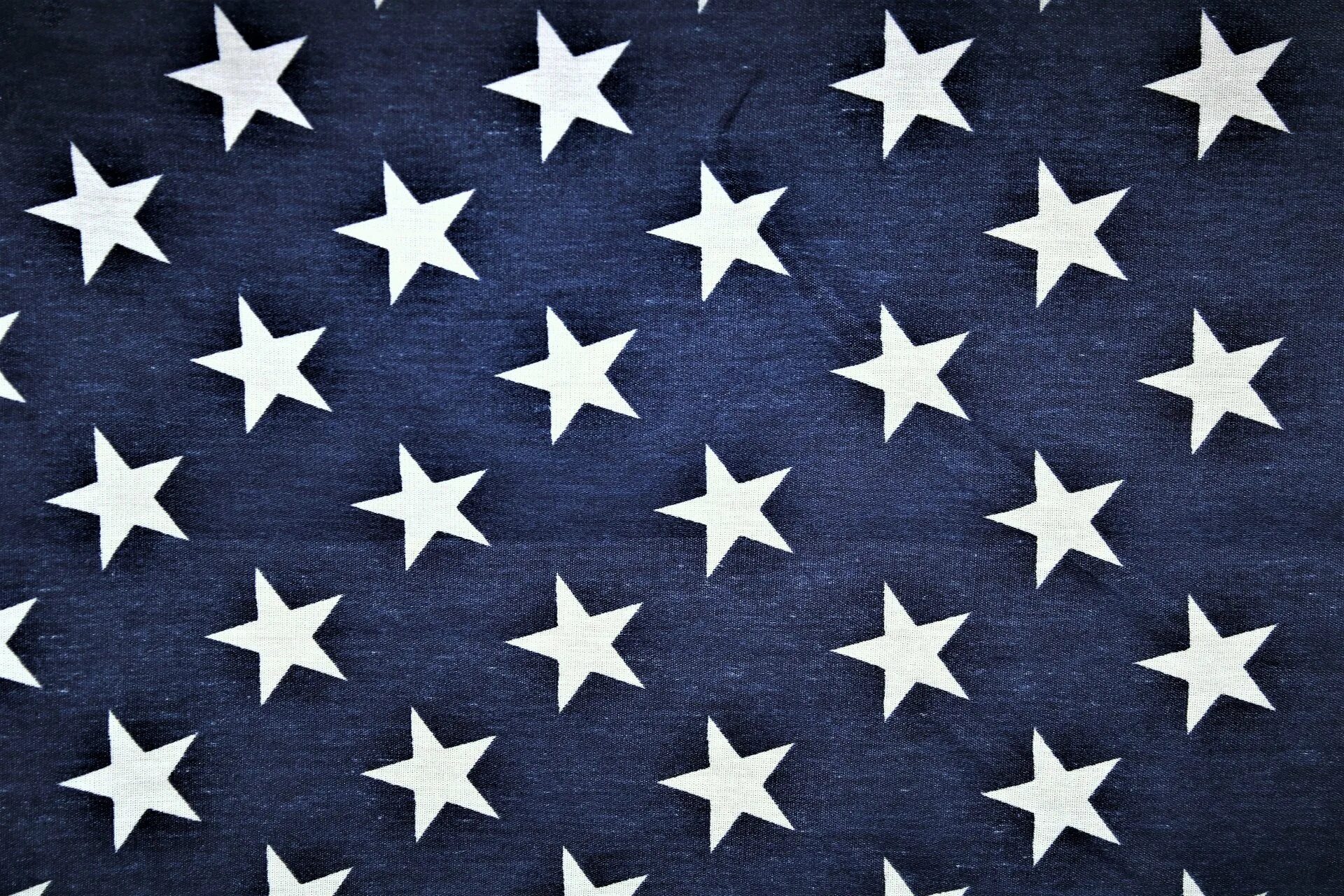 Флаг somalia. Белая звезда на синем фоне. Синий флаг. Белая звезда на синем фоне. Ткань со звездочками.