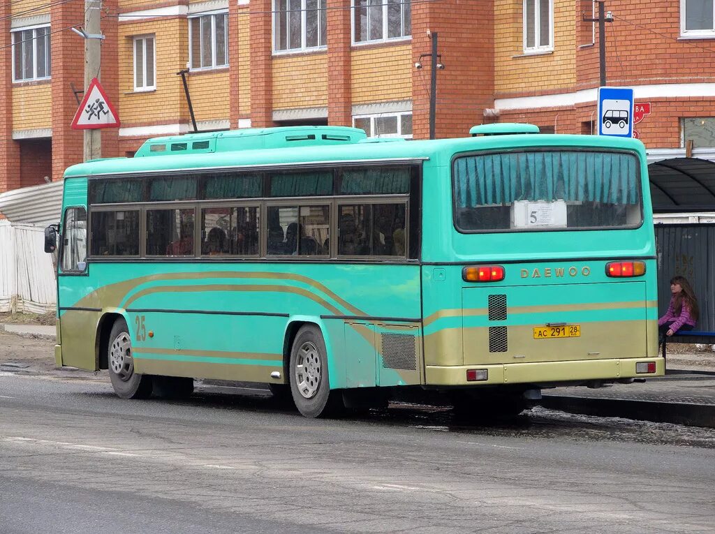 Автобусы белогорск амурская область. Белогорск Daewoo bs106. Автобусы Белогорск. Н323ут46. Е027нк69.