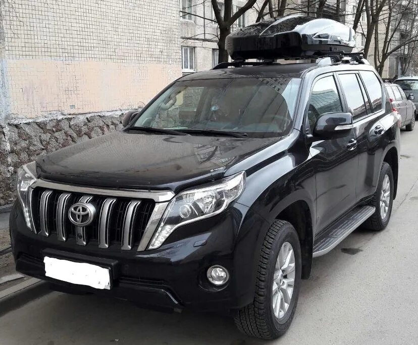 Купить прадо 18. Land Cruiser Prado 150 чёрный Drive. Бокс на тойоту Прадо 150. Pacific 780 на Прадо. Прадо 150 с черной крышей.