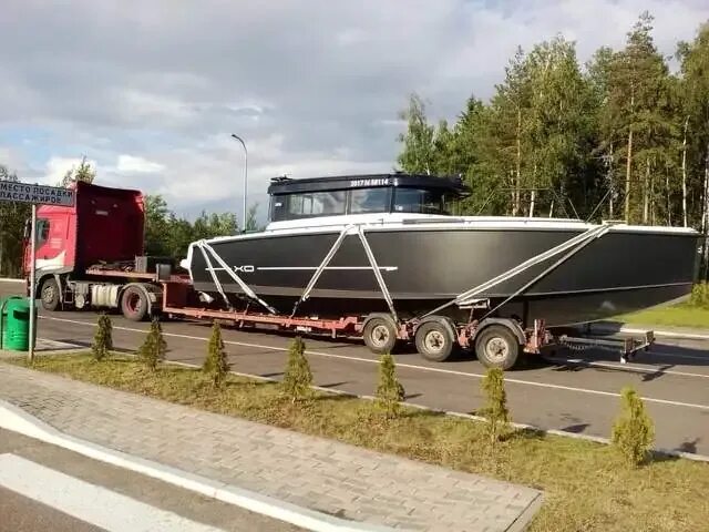 Перевезти катер. Транспортный катер. прицеп для яхты. катер для перевозки грузов. перевозка катера на прицепе.