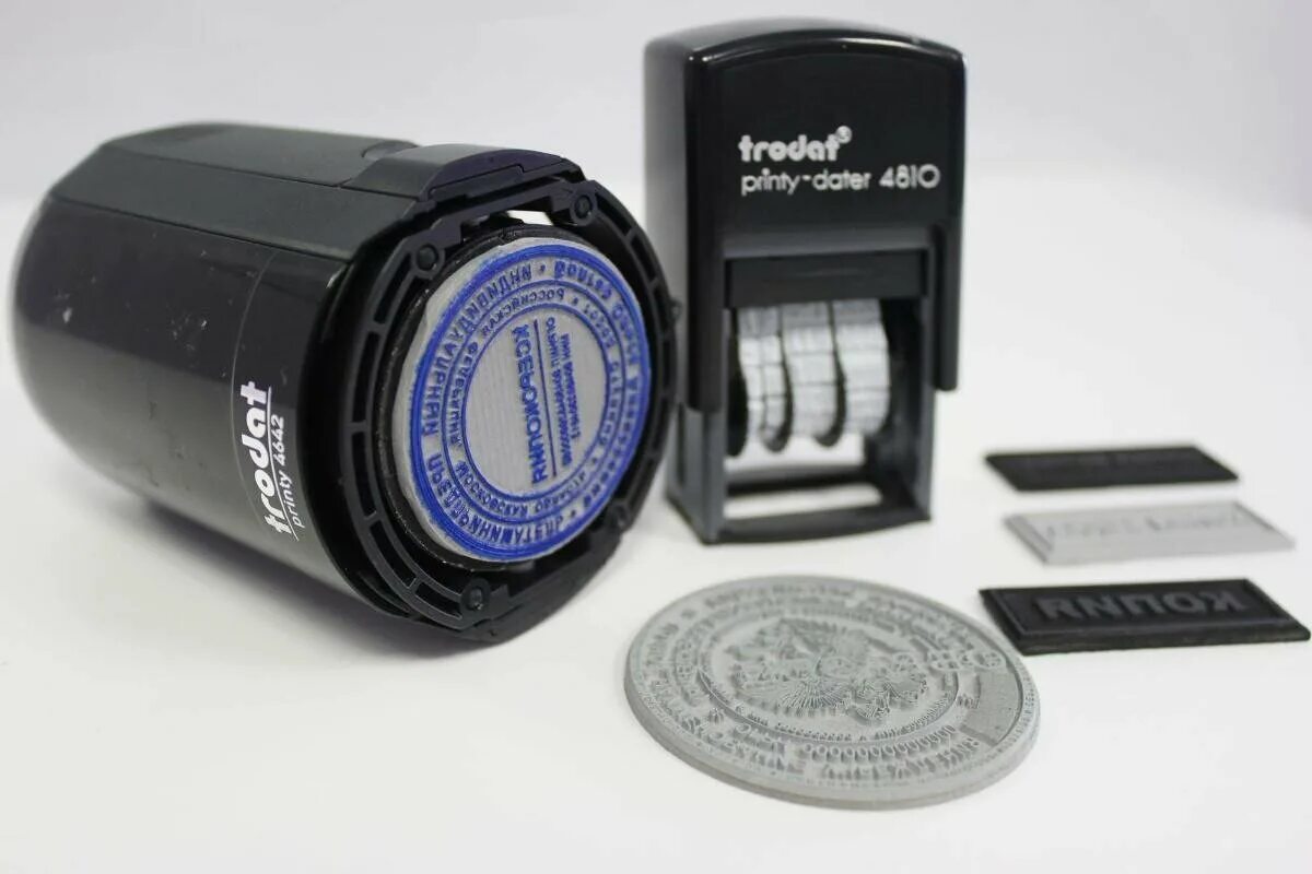 оригинальные и поддельные печати. оттиск печати. печати и штампы. экспертиза оттисков печатей и штампов. исследование оттисков печатей.