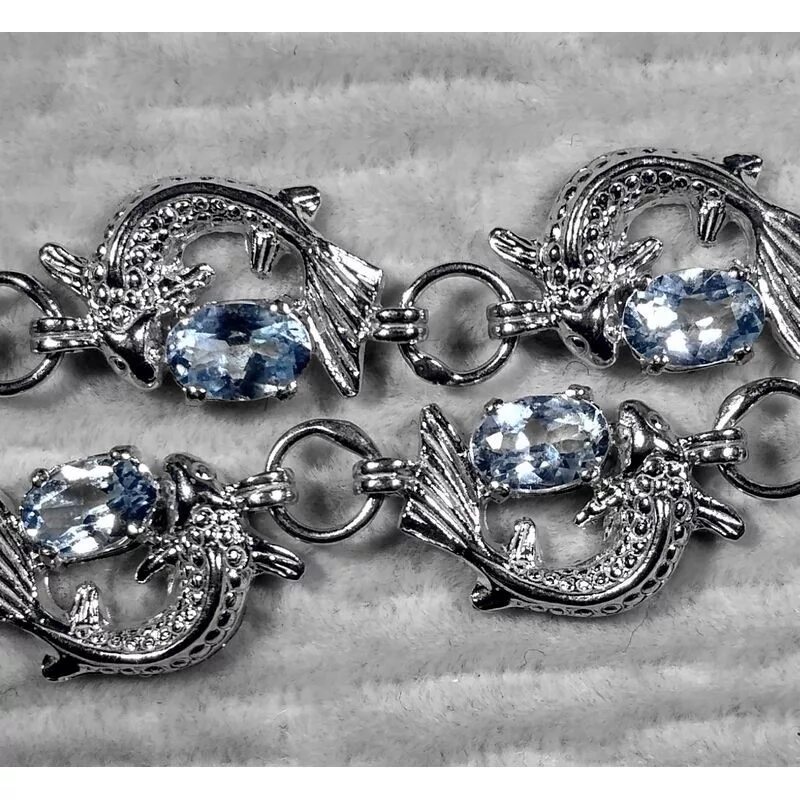 Серебряный каталог. Серебряный браслет с рыбками. браслет с топазом серебро. браслет с рыбками серебро. браслет православный рыбы.