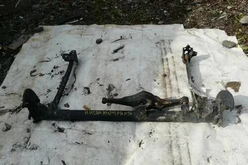 Задняя балка ниссан альмера н16. Задняя балка ниссан альмера н16. Задняя балка альмера в10. Nissan almera classic b10 задняя балка. Балка ниссан альмера классик.