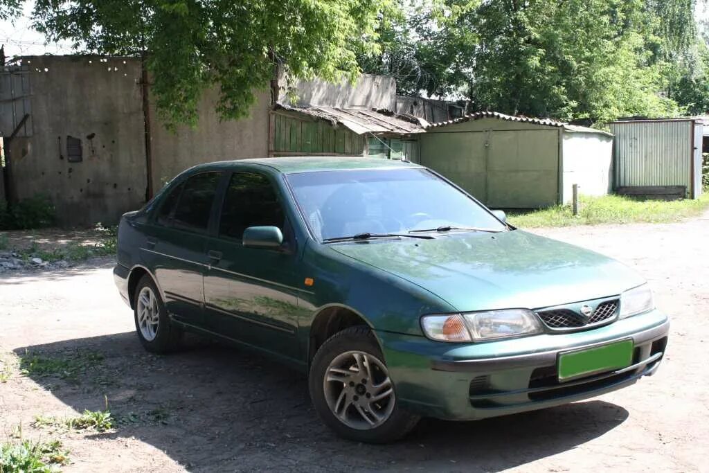 Ниссан Альмера 1999 хэтчбек кузов. Nissan Almera 1999 год. Ниссан Альмера 95г.