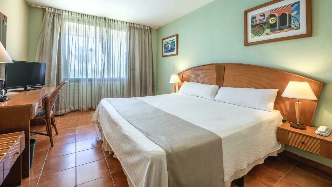 Отель Тукспан Варадеро. Отель Тухпан Куба Тукспан Варадеро. Отель Tuxpan Hotel 4. Cubanacan Tuxpan 4. Experience tuxpan