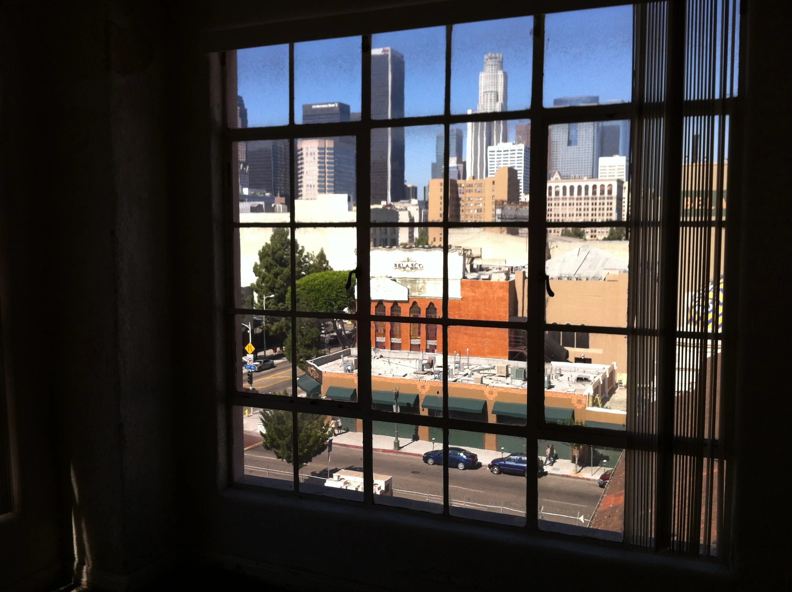 City Window. Apartment Window. Building through Window. Home Window in City. Windows side