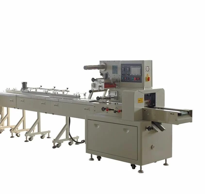 Automatic strip Packing Machine/product model SLB 40.0. Упаковочная машина для печенья. Вид сверху фасовочная машина для печенья. Упаковщик line Pack. Производство штучных изделий