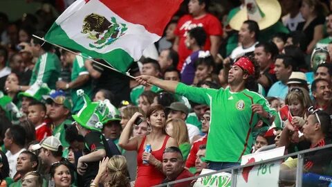 Record soccer crowd cheers on Mexico-Brazil match at Cowboys Stadium.