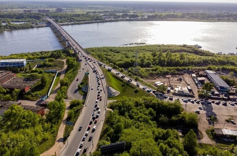 Томь в реальном времени томск. Мост через Томь в Томске. Коммунальный мост Томск. Северный мост Томск. Южный коммунальный мост Томск.