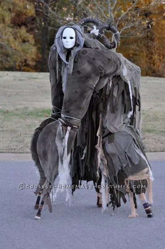 Is a four legged. Stilt Spirit костюм. Костюм чудища. Костюм на ходулях страшный.