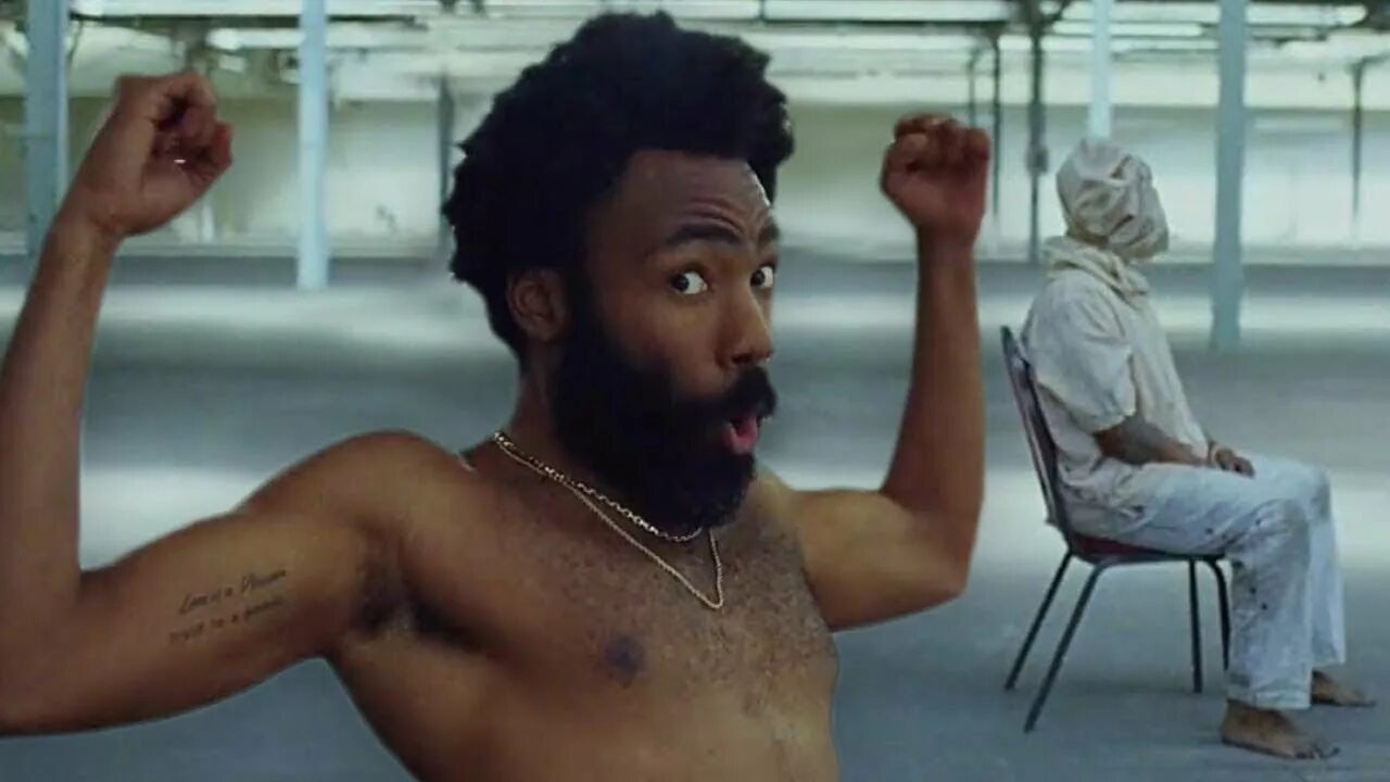 Чайлдиш Гамбино this is America. Гамбино ЗИС ИС Америка. Джон Дэвид Вашингтон this is America. Зис ис дойч