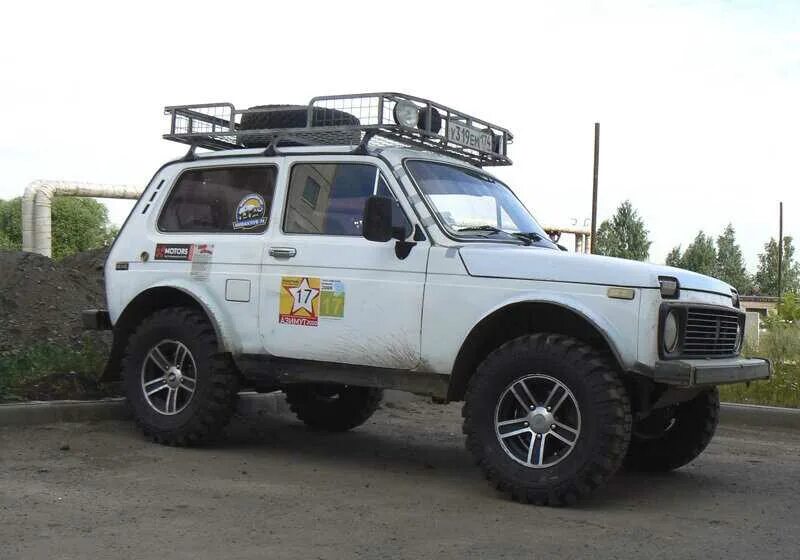 Ваз 2131 на 235 75 15. Шины ваз 2121 нива родные. Колеса от нивы шевроле на ниву 2121. Колеса шины нива 21213. Нива 2131 на 33 колесах.