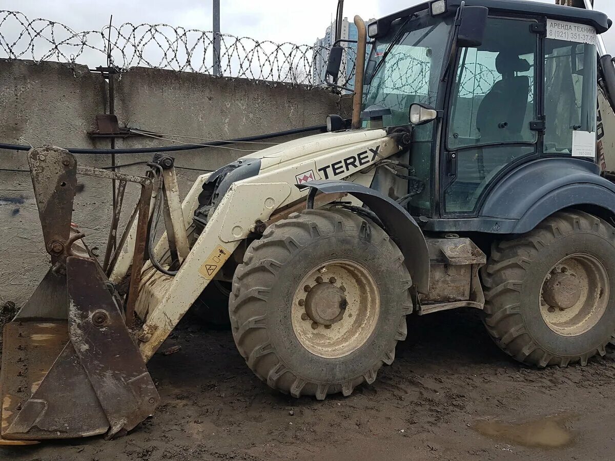 Экскаватор погрузчик Терекс 965. Экскаватор погрузчик Терекс 935 б/у. Экскаватор погрузчик Терекс равноколесный 1999. Трактор Терекс экскаватор погрузчик 800.