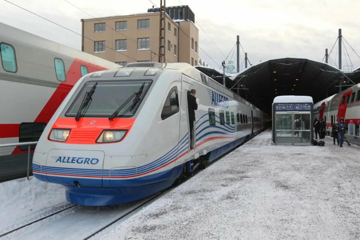 Курсируют ли поезда. Поезд Аллегро в Хельсинки. Финский поезд Аллегро. Поезд Аллегро вокзал в Хельсинки. Российско-финский поезд «Аллегро».