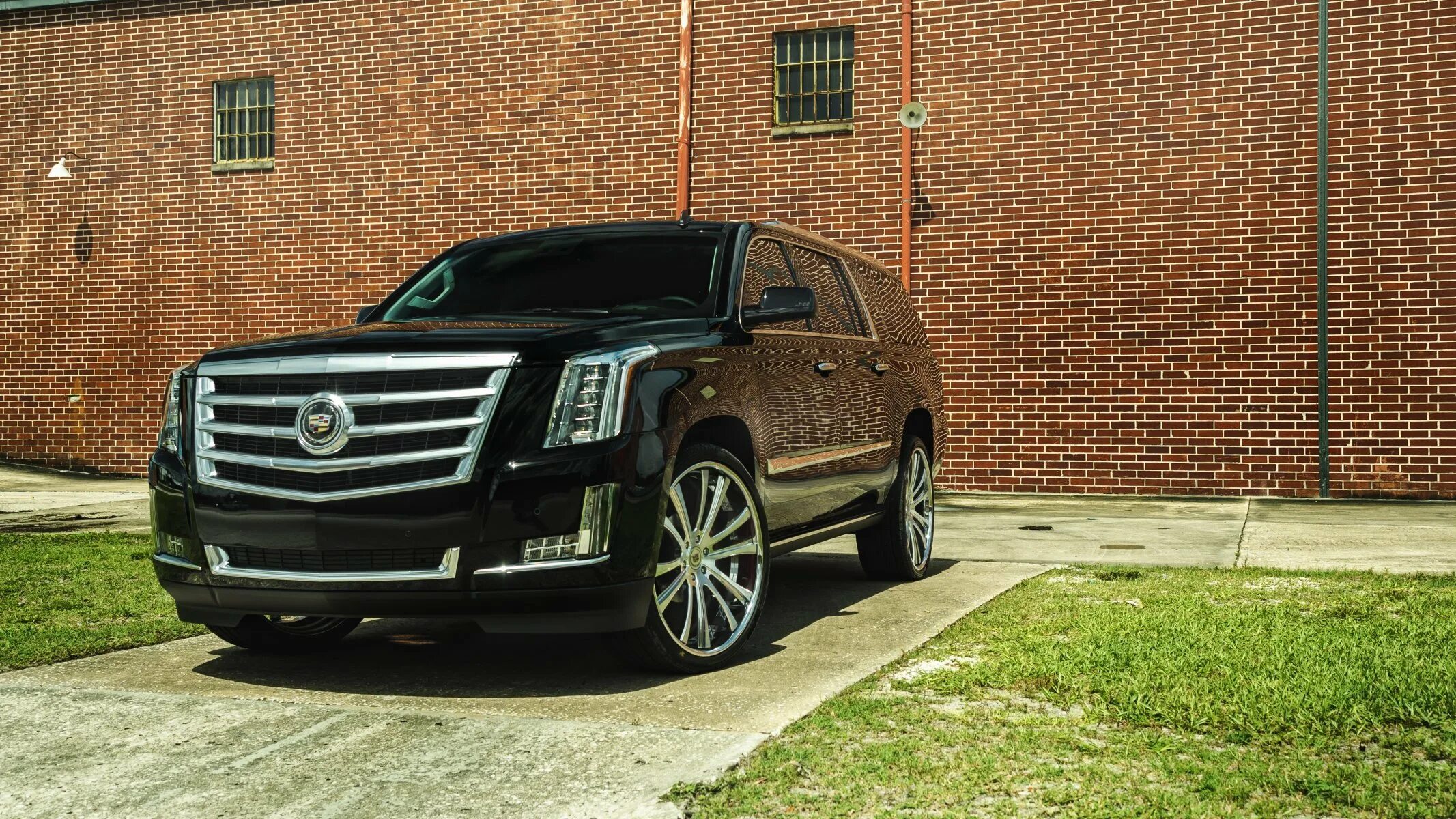 Едет черный кадиллак. Cadillac Escalade 2022. Кадиллак Эскалейд 2018. Cadillac Escalade ESV. Cadillac Escalade SUV.