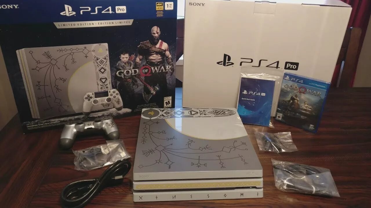 Sony playstation 4 god. PLAYSTATION 4 Pro God of War Limited Edition. Ps4 Pro God of War. Ps4 limit Edition 2tb полный комплект. God of War на плейстейшен 4.