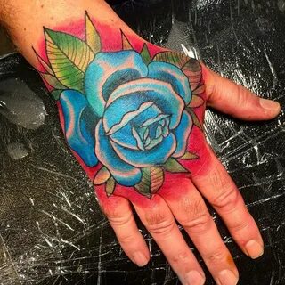Emerald rose tattoo