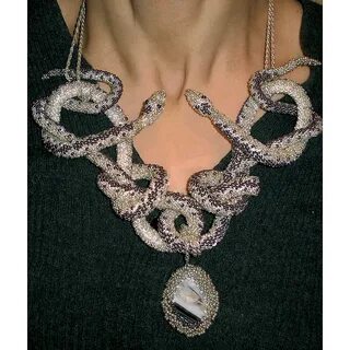 Украшение голова змеи