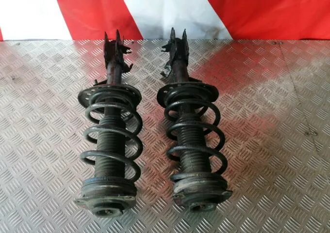 Стойка передняя ниссан кашкай j10. Передние стойки кашкай. На nissan qashqai 2011 года стойки передние разборные или нет. 5тд. Стойка nissan qashqai j10.