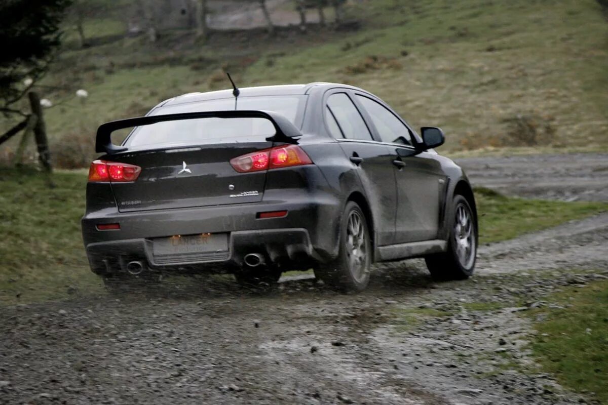 Лансер 10 полный. Лансер Эво 10. Mitsubishi Lancer EVO 10 зад.