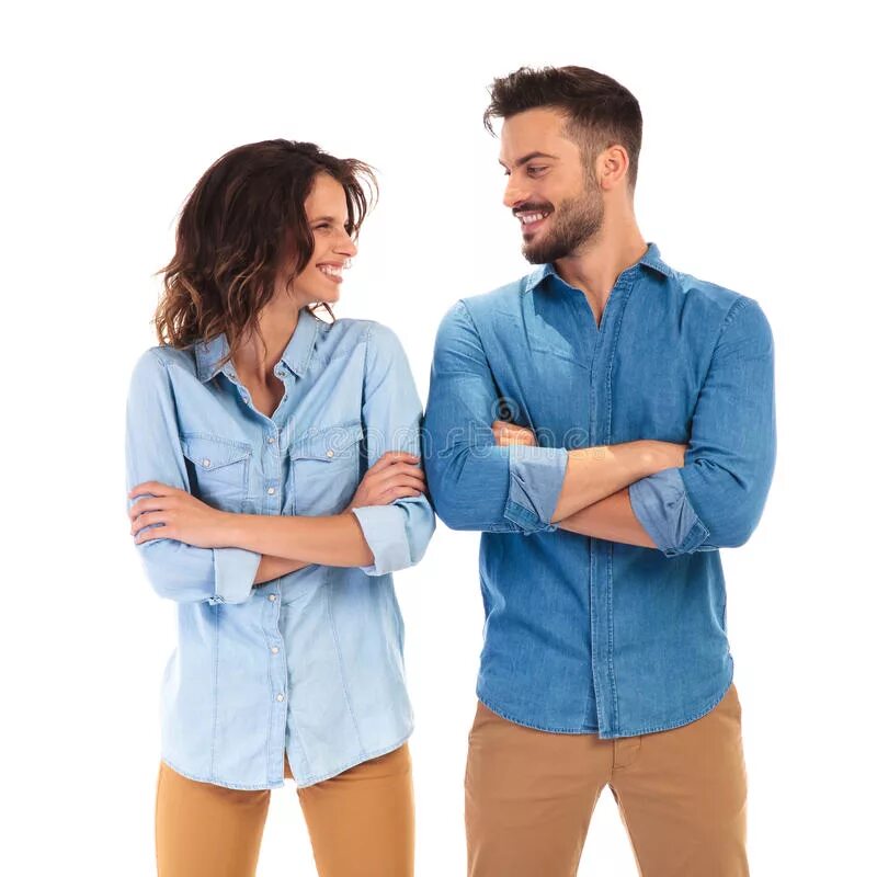 Looking at each other. Each other одежда. A man and a woman look at each other. Men and women laughing Casual.