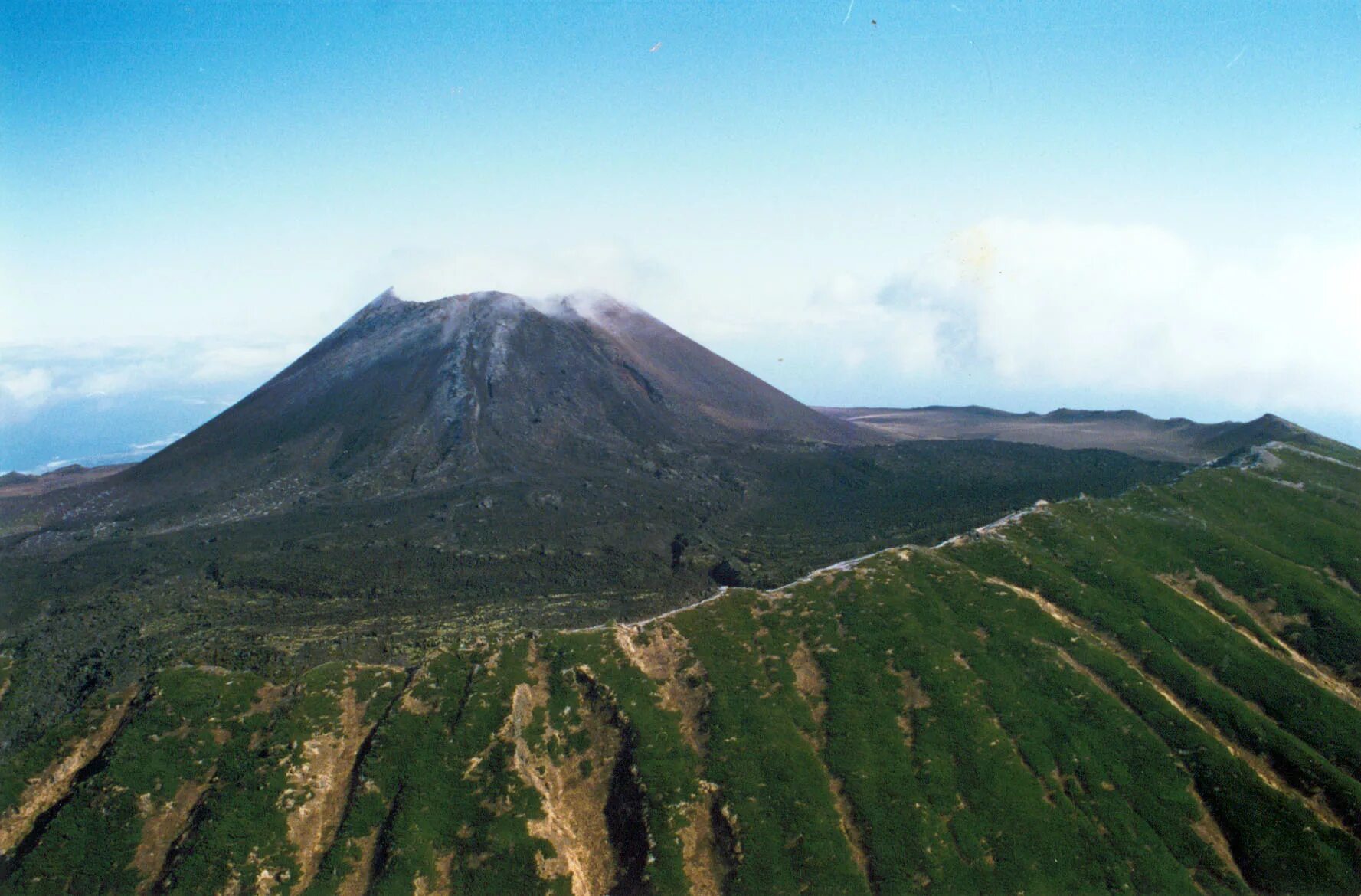 Volcano island. Остров Кунашир вулкан тятя. Курильский заповедник вулкан тятя. Кальдера вулкана тятя. Сопка Кунашир.