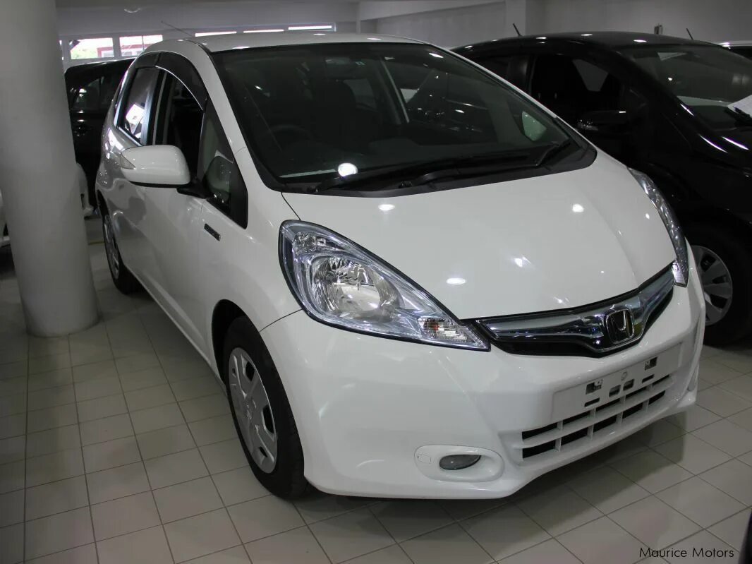 Honda Fit 2014 гибрид. Honda Fit Hybrid. Honda Fit Hybrid White. Honda Fit Hybrid 2017. Фит гибрид 2014