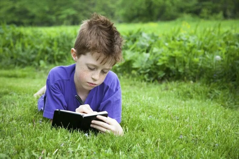 Keeping diaries. Learning something. Photo of student who are reading Learnin smth'.