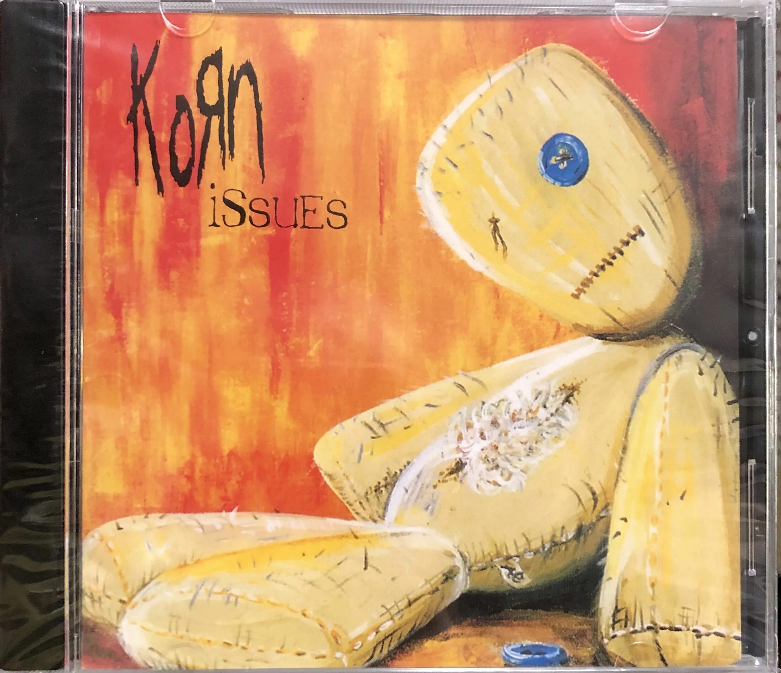 Korn "issues". Korn issues кукла. Корн альбомы. Альбом korn issues. Korn 1994 album cover.