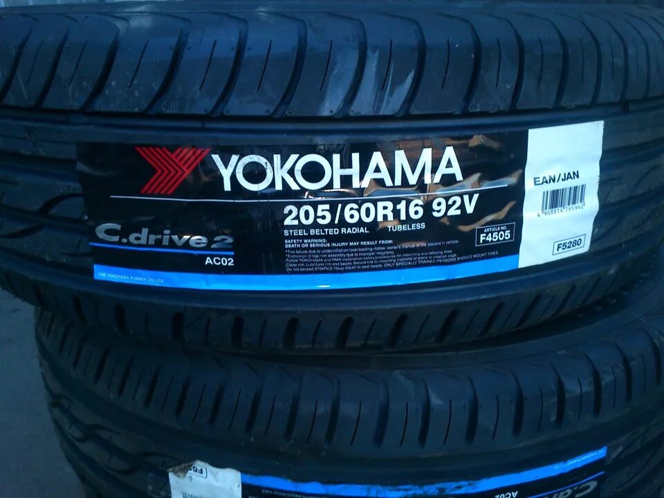 Шины yokohama 60 купить. Yokohama c Drive 2. Йокогама c.Drive 2ac02a. Yokohama 235/50/18 v 97 ac02a. Yokohama c Drive.