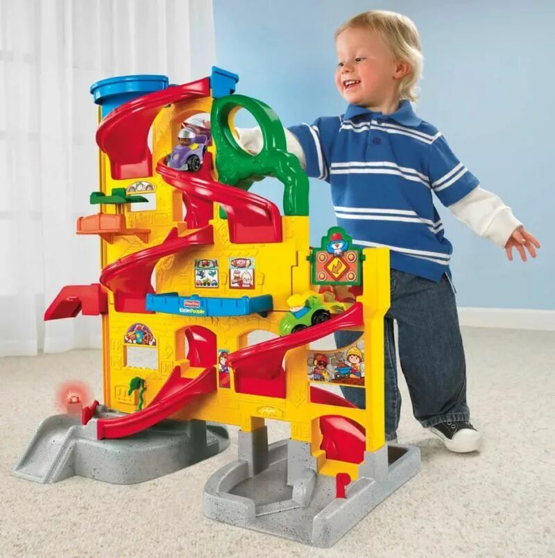 Что подарить ребенку на 2 года мальчик. Гараж-паркинг Fisher Price. Fisher Price little people горка. Автотрек Fisher Price little people.. Парковка Fisher Price.