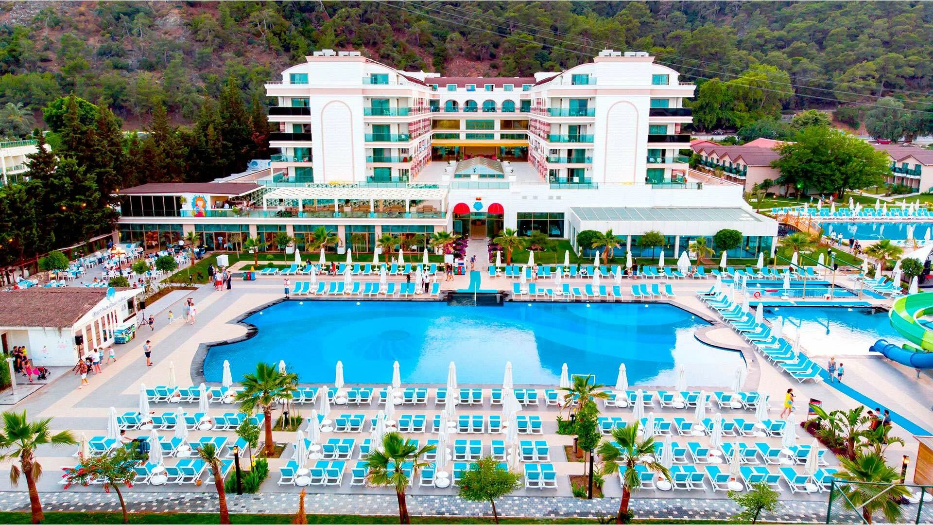 Dosinia luxury. Отель dosinia luxury resort 5. досиния лакшери резорт кемер. турция кемер досиния лакшери резорт 5. турция dosinia luxury resort 5 бельдиби кемер.