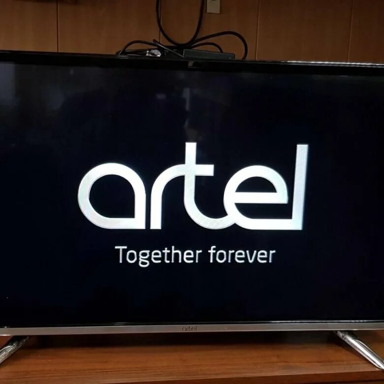 Телевизор артель 32. Artel TV 32ah90g. Артел телевизор 32 2021. Артель телевизор 32 НАРХЛАРИ. Artel телевизор логотип.