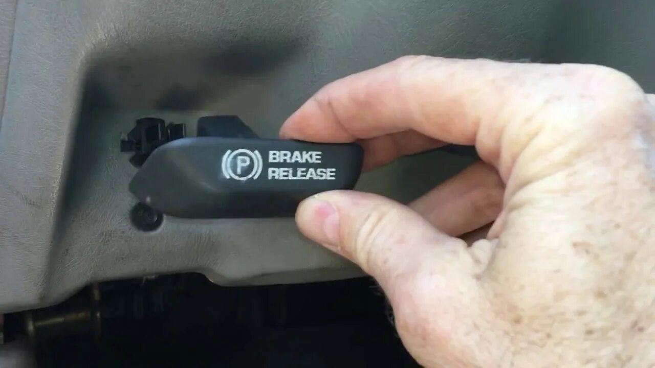 Buick parking brake cable. Release parking. Parking brake emergency release button. Brake release в машине nissan. Handbrake is applied в ауди.