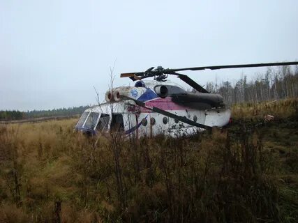 Вертолет ми 6 лежит в болоте
