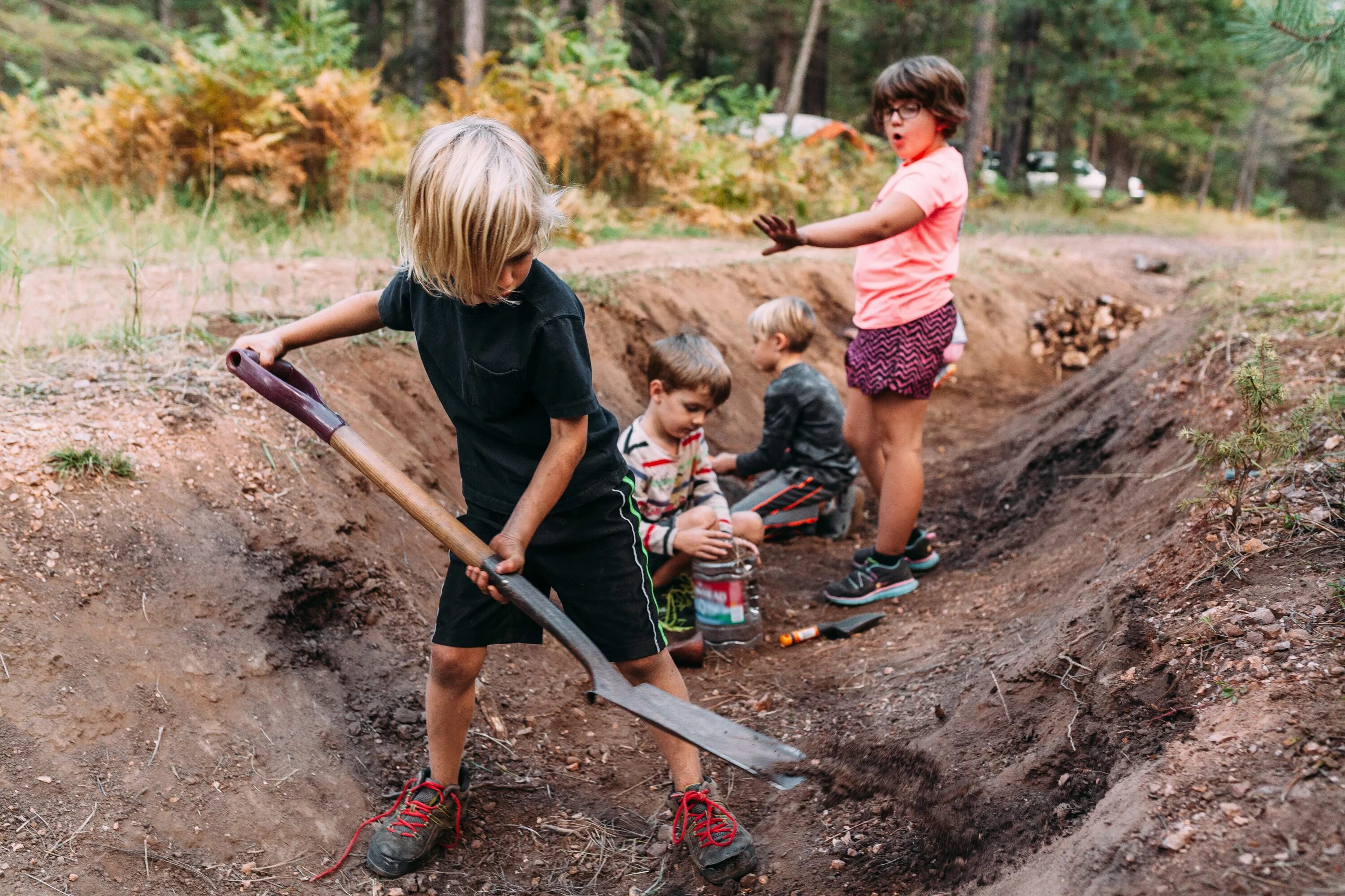 Digging 4. Digging. Dig for Kids. A boy is digging the ground. Small dig.