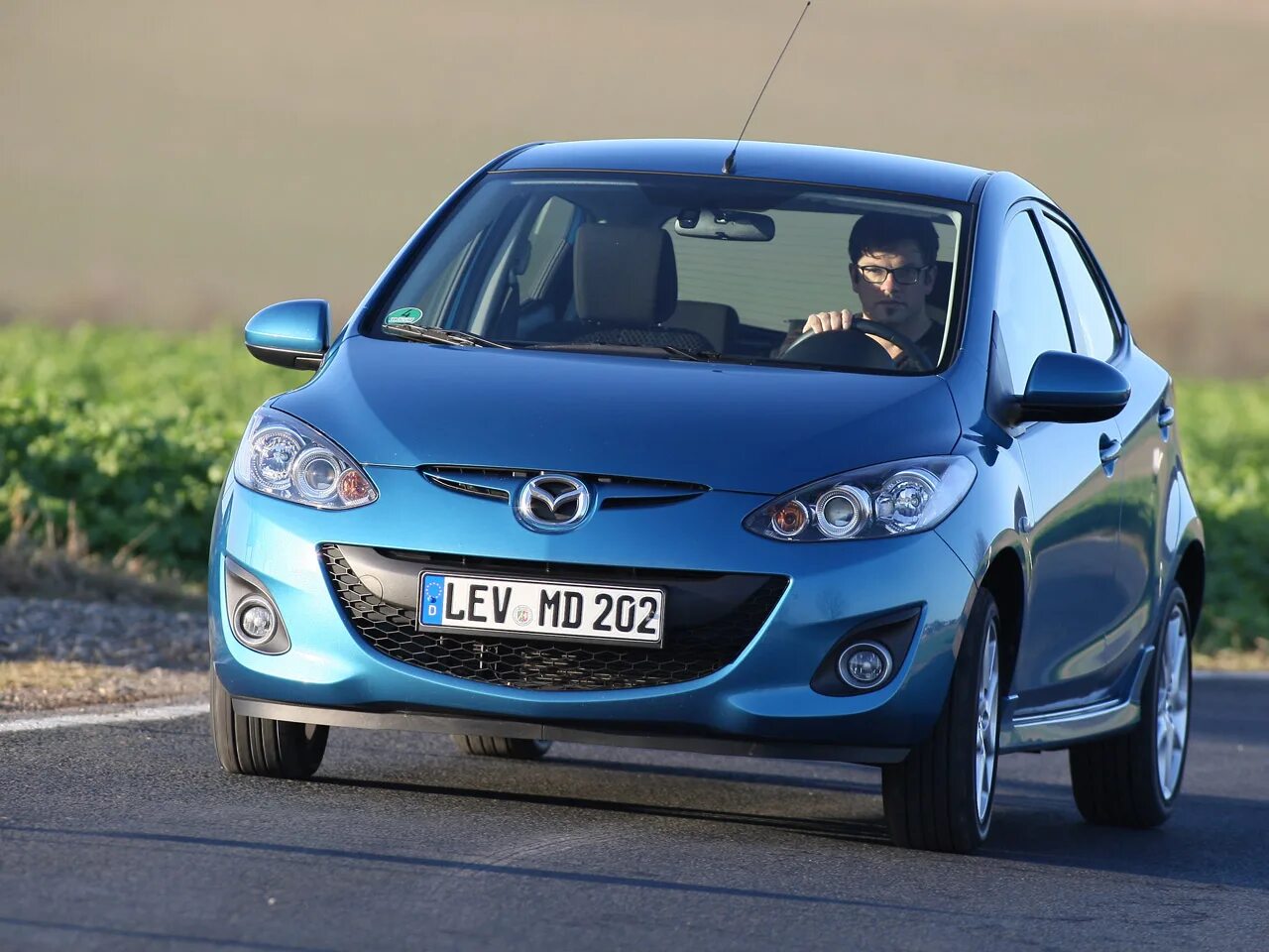 Самая mazda. Mazda 1. Mazda 1.2. Mazda 2 Yaris. Мазда 6 2.2.