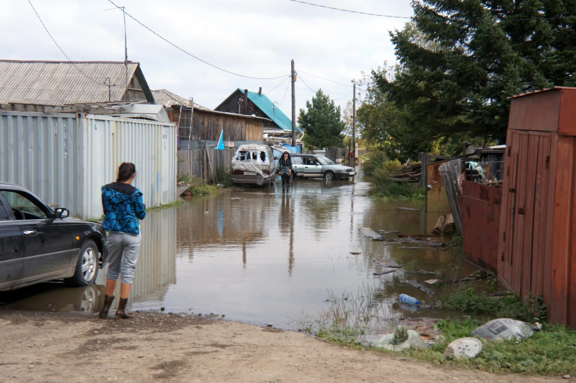 Дом попал в зону подтопления. Комсомольск на Амуре потоп 2013. Комсомольск на Амуре наводнение. Комсомольск-на-Амуре 2013 год наводнение. Комсомольск на Амуре затопило.