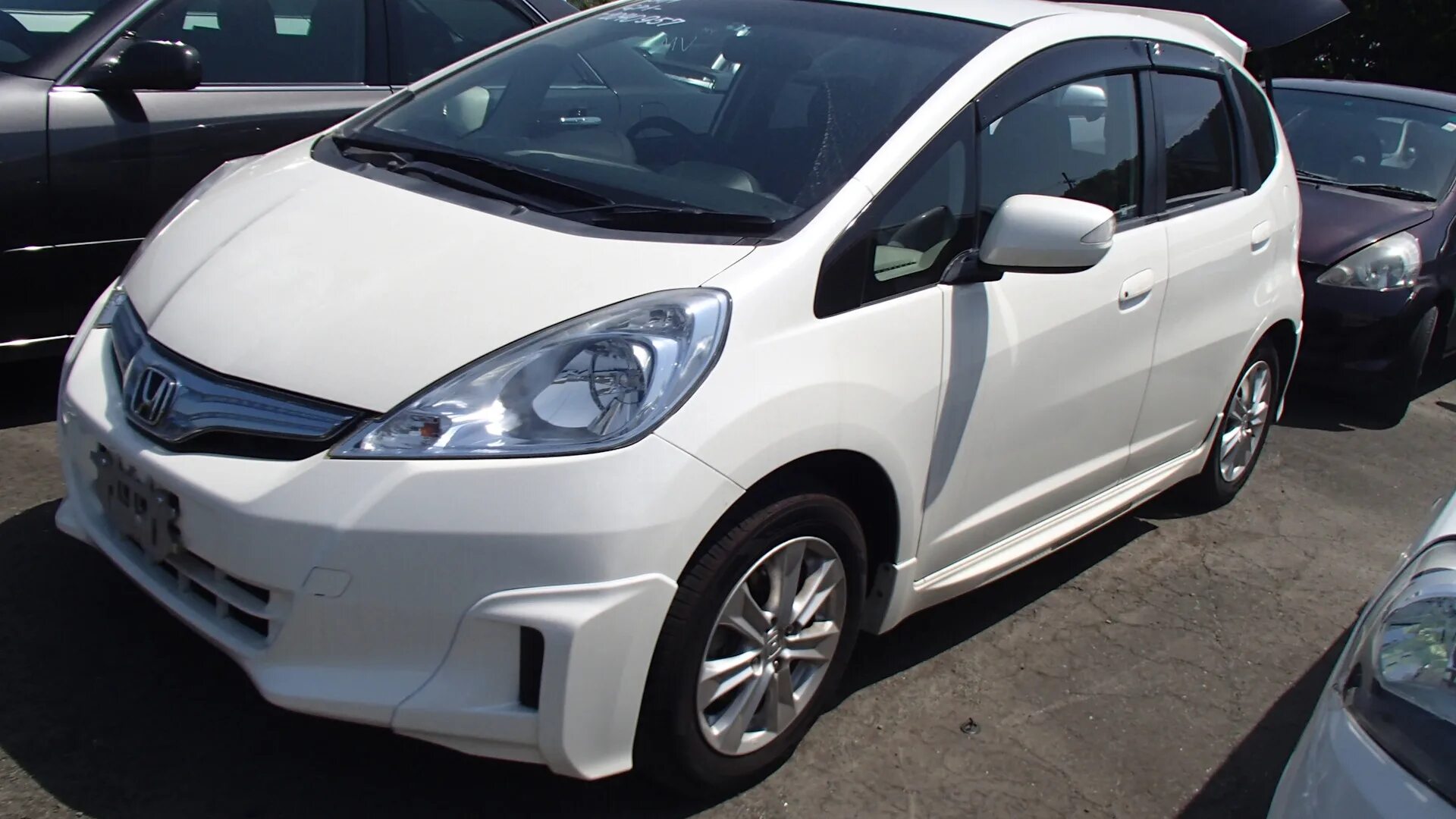 Хонда фит аукцион. Honda Fit Hybrid. Хонда фит гибрид 2012. Хонда фит гибрид 2011 года. Honda Fit 2011 года.