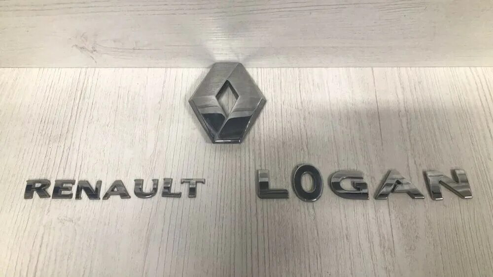 Эмблема рено логан 2. Logan 2 эмблема renault. эмблема логана цена.