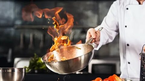 A chef cooks food