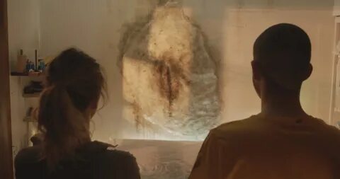 Heston Horwin and Jillian Harris study the mysterious Thing on the Wall in DEAD...