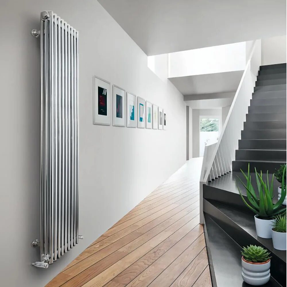 Вертикальные радиаторы отопления для дома. Радиатор zehnder charleston 3180. радиатор трубчатый вертикальный zehnder. радиаторы zehnder в интерьере. вертикальный радиатор zehnder хром.
